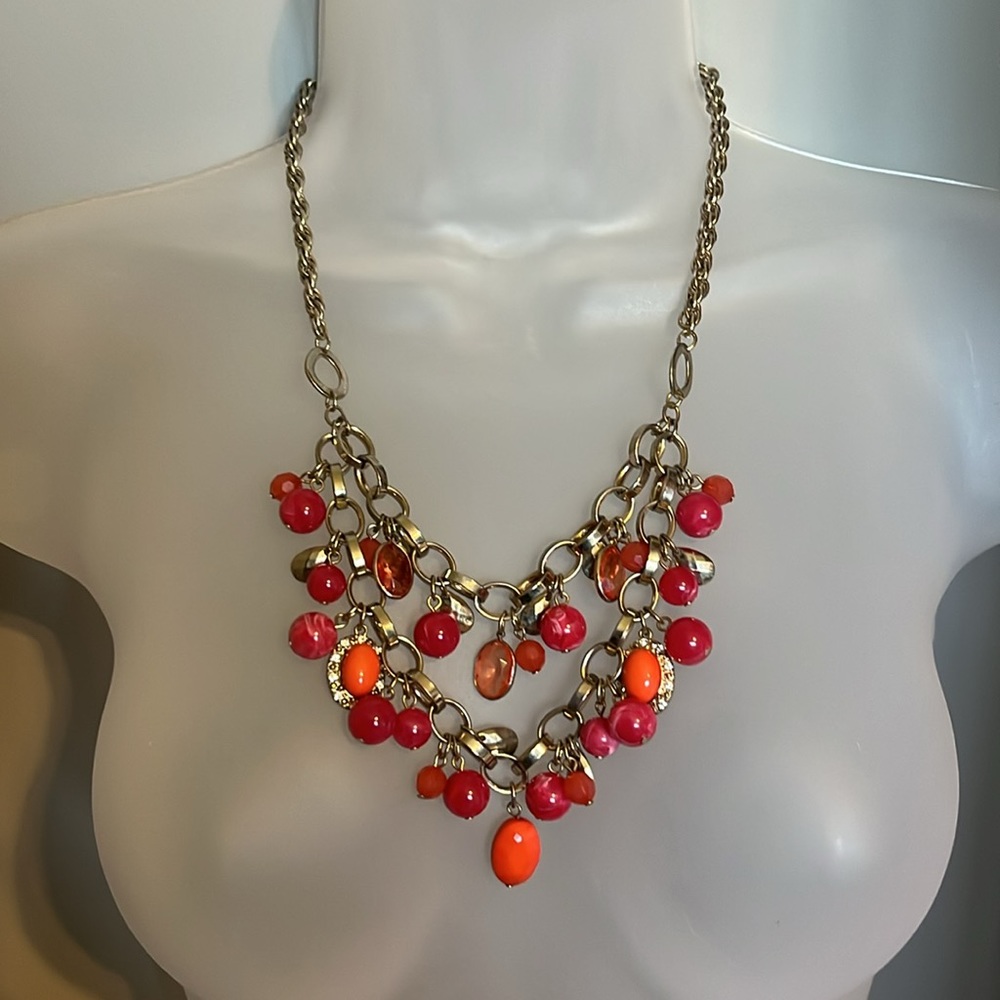 Ann Taylor necklace. Bright pink and orange stones with crystals. Gold chain.